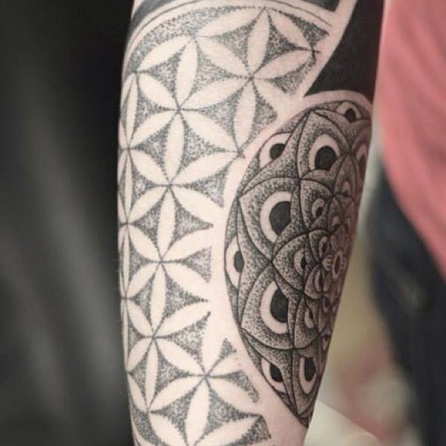 Thinking of Getting a Sacred Geometry Tattoo? 15 Close-up of precise geometric tattoo linework
